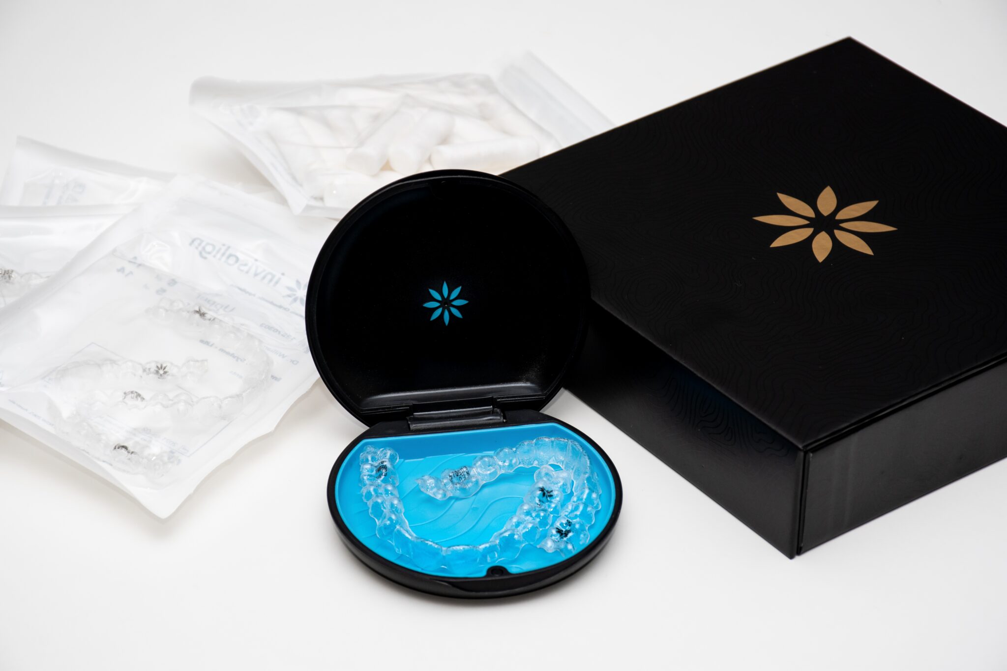 Invisalign aligners in case with packaged trays for digital orthodontic treatment planning